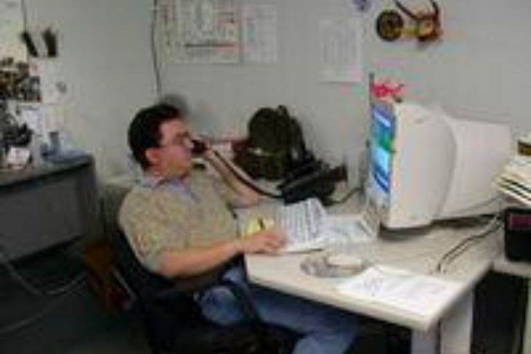 John at computer in 90s