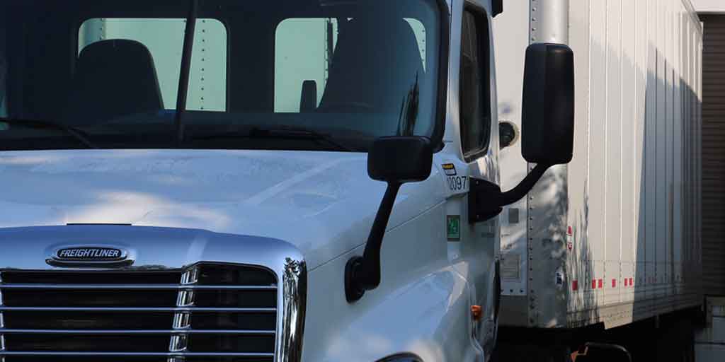 The front cab of an Excel Courier Freight Transport Vehicle