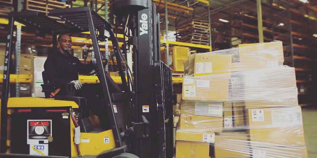 Forklift in Excel Courier's warehouse